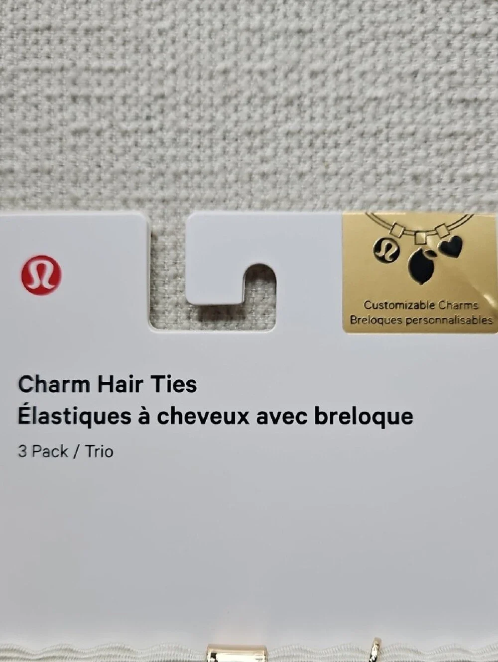 lululemon athletica Charm Hair Ties Trio — White Bands with Red & Pink Charms
